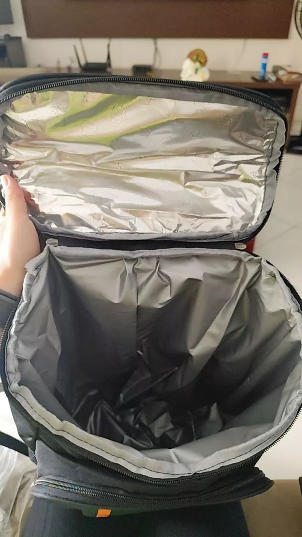 Foto de Juliana P. com a mochila térmica cooler 23L